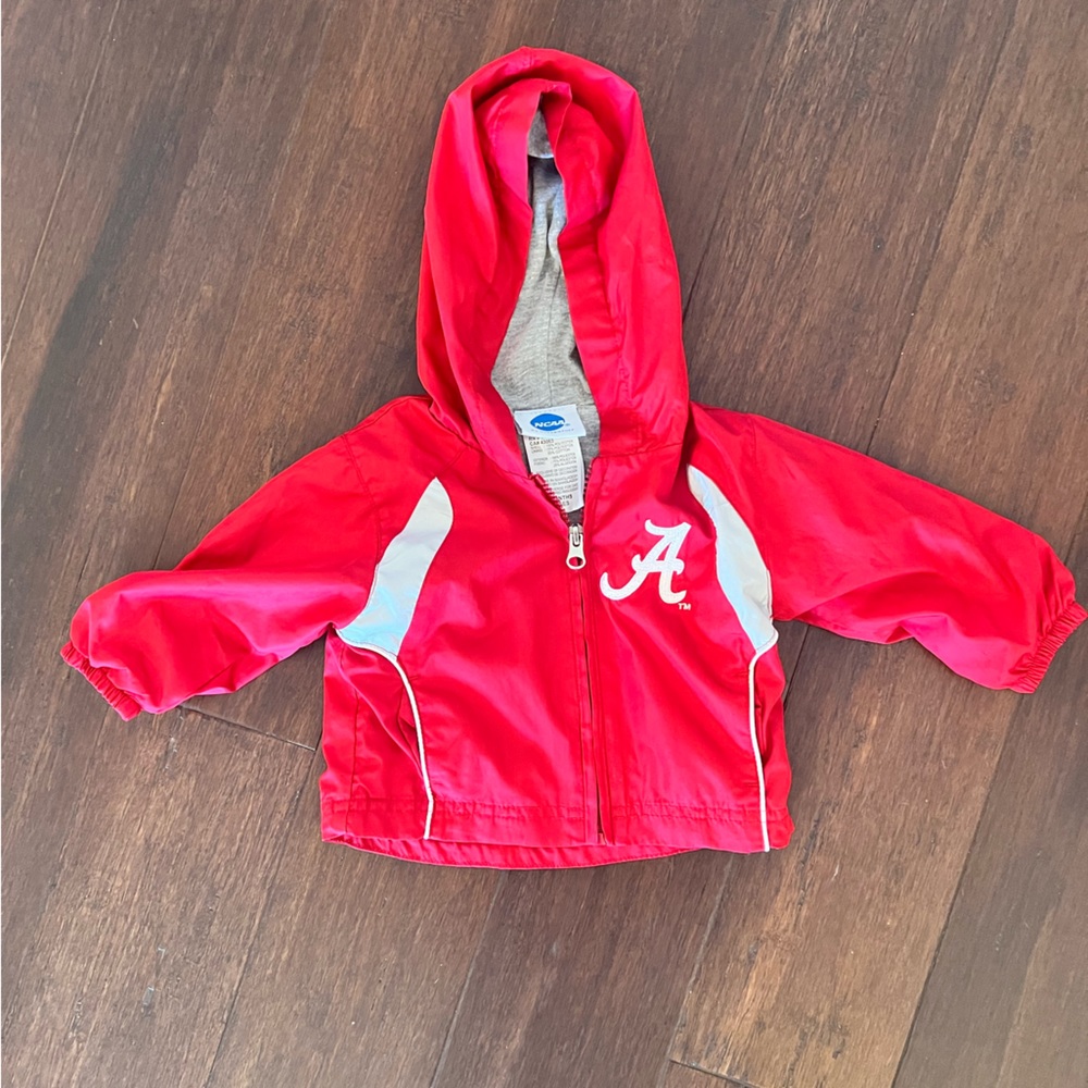 Kids Alabama rain jacket. Only worn once - excellent condition. Size: 12 months.